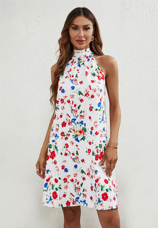 Mini-jurk met bloemenprint, halternek en strikbandjes in het wit